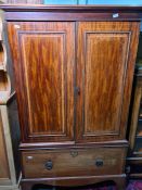 19th century mahogany and satinwood banded linenpress with two doors opening to reveal linen