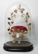 A 19th century French marriage throne 'Globe de Mariee', the gilt brass frame set with mirrors and