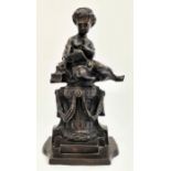 Late 19th/early 20th century bronze figure of lady seated on pillar, reading a book