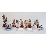 Capodimonte tinted bisque figure of a choirmaster with four choirboys, a Doulton china figure '