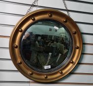 Circular convex mirror with gilt-effect frame, 42cm diameter approx