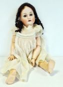 Simon & Halbig bisque headed doll no.403, impressed Germany 62, with sleeping brown eyes, open