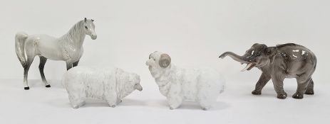 Beswick pottery model of a horse, 17cm high, an elephant and a pair of Lladro models of sheep,
