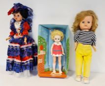 Mid 20th century plastic Sweetheart doll wearing red, purple and white long dress and bonnet, boxed,