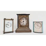 19th century brass four glass carriage clock with enamel dial and Roman numerals, another smaller