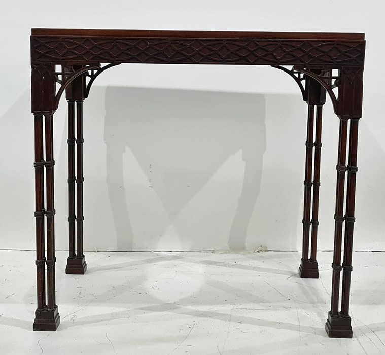 20th century Georgian-style table of rectangular form, blind fretwork moulding to the sides, the