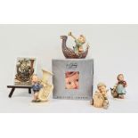 Collection of Goebel ceramics, comprising a rectangular postcard plaque on easel and four Hummel fig
