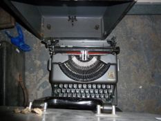 Portable typewriter and two vintage sewing machine  and a picnic gramophone (4)