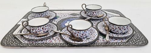 19th century finely decorated enamel and hand-painted coffee service comprising five cups and