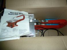Black & Decker electric hedge trimmer, a boxed table jigsaw, two saw horses, a carpenter's toolbox