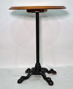 Circular centre table on cast iron base, 59cm diameter