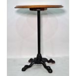 Circular centre table on cast iron base, 59cm diameter