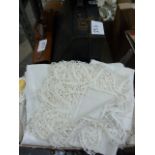 Quantity of table linen, lace, other linens, an accordion, a portable typewriter, a leather