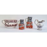 Pair of graduated 19th century Masons pottery jugs decorated with stylised dragons and Dogs of Fo, a