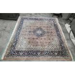 Chakhari Indo-Persian carpet, the central medallion with floral decoration, stepped foliate