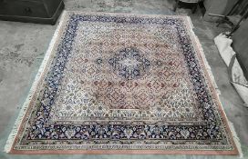 Chakhari Indo-Persian carpet, the central medallion with floral decoration, stepped foliate