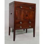 19th century mahogany washstand the side flaps opening to reveal compartmented interior for basin,