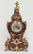 19th century French boulle work tortoiseshell and gilt brass metal mounted clock with circular dial,