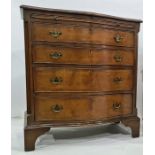 20th century mahogany serpentine-fronted bachelor's chest, the moulded edge above brushing slide and