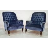 Pair of salon chairs in blue ground buttonback upholstery, turned front legs terminating to brass