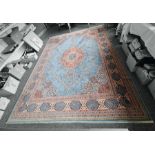 Persian rug, the central stepped foliate medallion on a light blue field, stepped foliate spandrels,