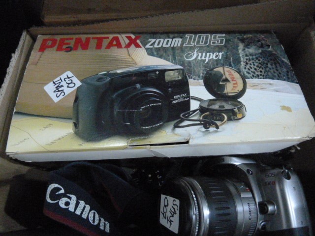 Vintage cameras including two 8mm movie cameras, a camera tripod, a Pentax zoom 105 in original box,