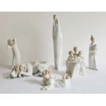 Five Lladro figures, painted and impressed marks, comprising a figure of the Madonna, 35cm high, a