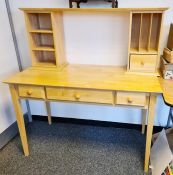 Beech desk, the top with assorted pigeonholes, the base with three drawers, on square section