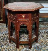 Early 20th Century octagonal inlaid Middle Eastern tray table with floral inlay, on stand, 45cm wide