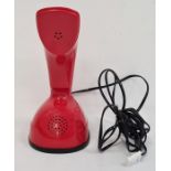 Ericsson LM retro red telephone with turn dial to base, 21cm high