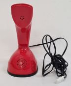 Ericsson LM retro red telephone with turn dial to base, 21cm high