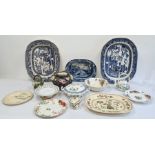 Two large 19th century meat plates, a smaller 19th century blue and white Rockingham pottery dish, a