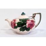 Llanelly pottery compressed globular teapot and cover, printed black marks, painted with pink rose s