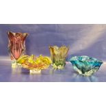 Four Murano style coloured art glass vases, each of thick walled petal-shaped form, comprising a