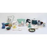 Poole pottery tableware, Poole pottery model dolphins, posy vases, a Sylvac blue pottery rabbit,