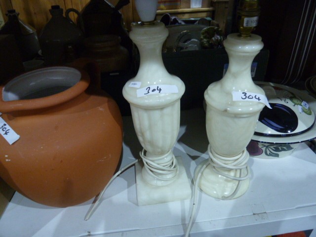 Alabaster table lamp, another, an earthenware oversized jug, empty Moorcroft boxes, framed prints,