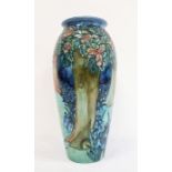 Moorcroft pottery tall ovoid vase with tube-lined decoration of woodland trees and bluebells,