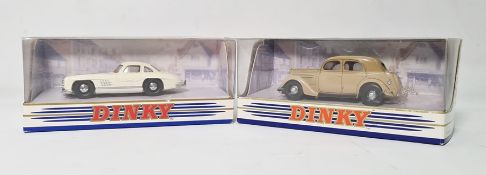 Two boxed Matchbox cars from the Dinky series, 1955 Mercedes Benz 300SL Gullwing (DY-12) and 1950