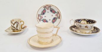 Two Royal Worcester coffee cups and saucers, late 19th century, printed puce green and impressed