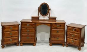 A modern pine dressing table, mirror and two matching bedside tables (4)