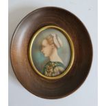 Reproduction portrait miniature of woman (possibly over painted print) 6 x 5 cm
