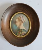 Reproduction portrait miniature of woman (possibly over painted print) 6 x 5 cm