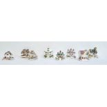 Collection of eight various bone china porcelain and pottery incense burners in the form of cottages