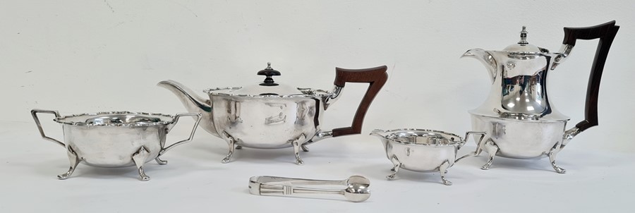 Four-piece silver tea service comprising teapot, hot water jug, two-handled sugar bowl, milk jug and