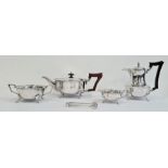 Four-piece silver tea service comprising teapot, hot water jug, two-handled sugar bowl, milk jug and