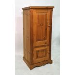 20th century pine cabinet with two cupboard doors, raised on bracket feet and contents of a JVC