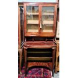 Early 20th century mahogany cabinet with two glazed doors enclosing shelves, above pigeonholes, desk