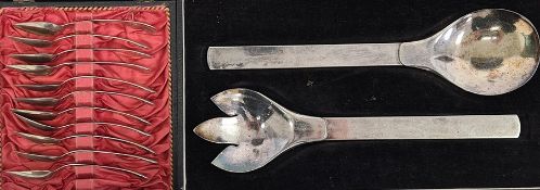 Set of 11 white metal foreign teaspoons in case and white metal salad servers in case