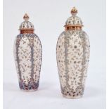 Pair of Worcester 'Grainger & Co' reticulated slender oviform Persian-style vases and domed
