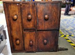 19th century mahogany commode raised on turned supports